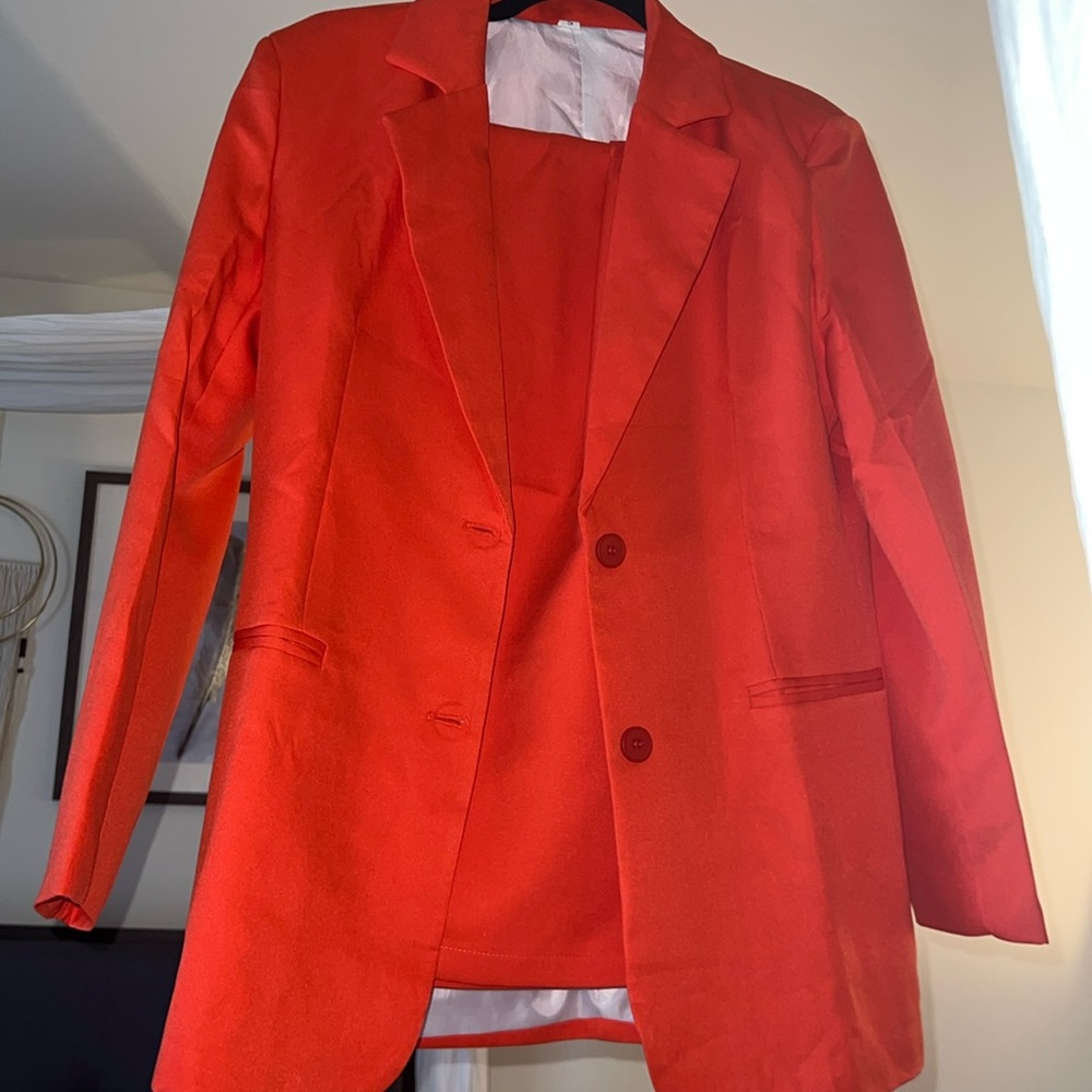 Orange pant suit